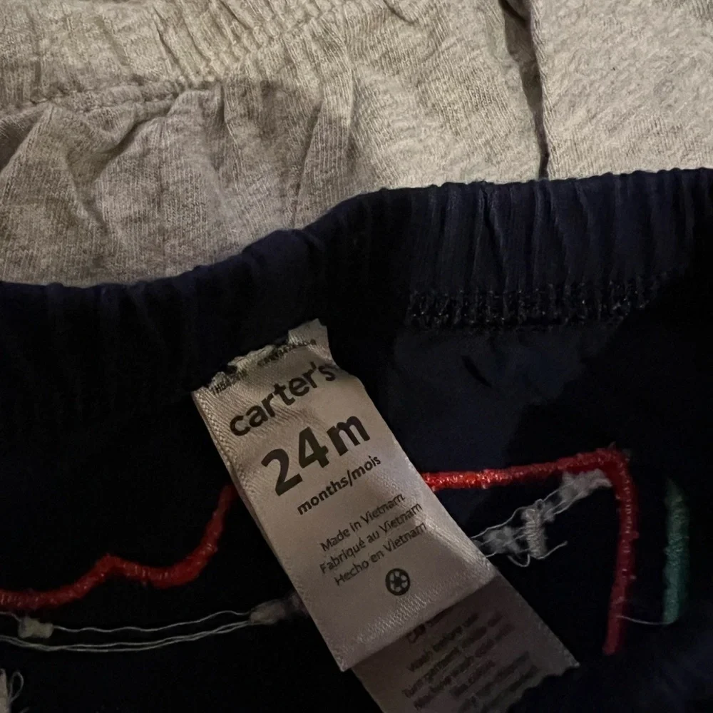 Carters set of two infant shorts,‎ one with watermelon on the bottom